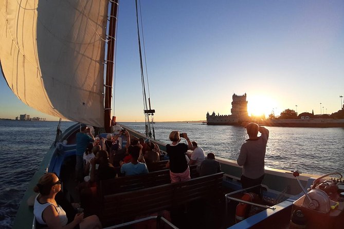 2-Hour Lisbon Traditional Boats Sunset Cruise with White Wine - Where you meet the boat and how boarding feels in central Lisbon