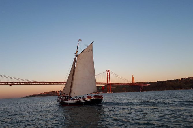 2-Hour Lisbon Traditional Boats Sunset Cruise with White Wine - White wine flow, onboard vibe, and the music question