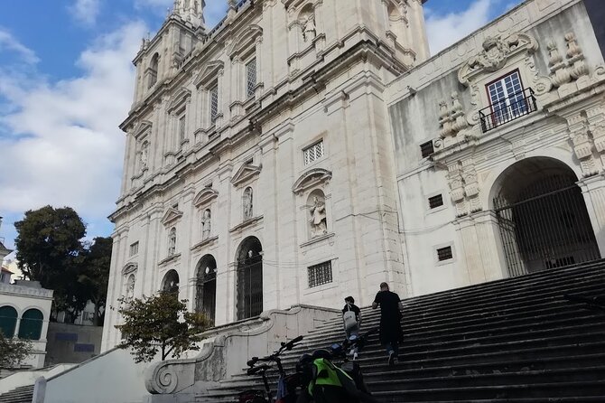 7 Hills and 14 Viewpoints - Lisbon E-Bike Tour - Largo do Carmo and Santa Justa access: revolution-era square to classic city views
