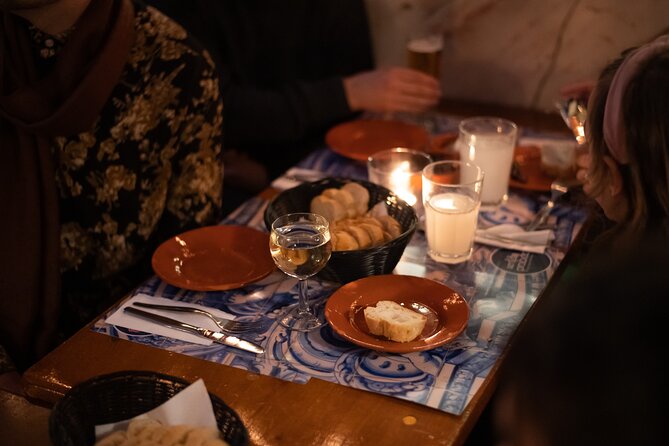 A True Taste of Lisbon: Portuguese Tapas, Wine & Surprise Drink - Drinks and pacing: wine included, plus a surprise drink