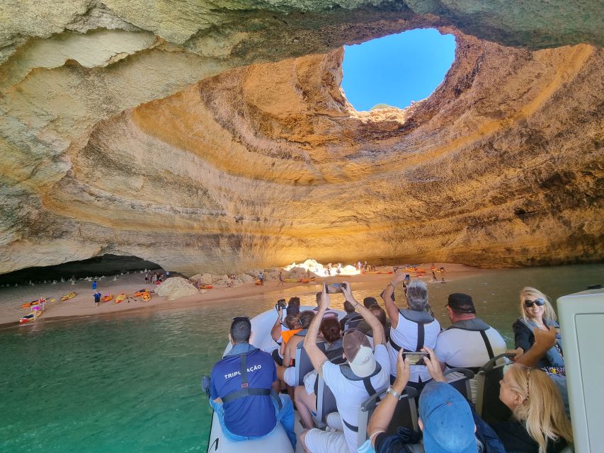 Albufeira: Benagil Cave and Dolphin Sightseeing Boat Cruise - Senhora da Rocha caves and gold-colored sand, the in-between stop that matters