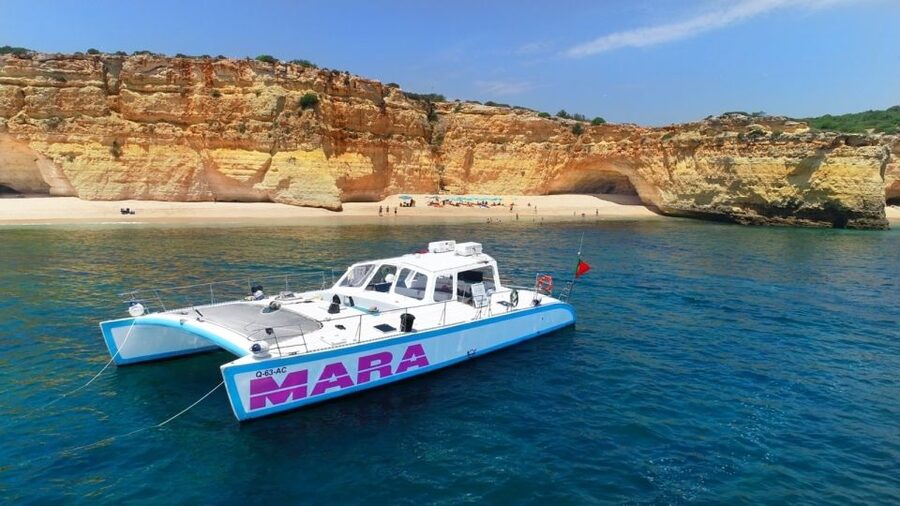 Albufeira: Catamaran Cruise with BBQ & Open Bar on the Beach - How the Dinghy Gets You Closer to Benagil Caves