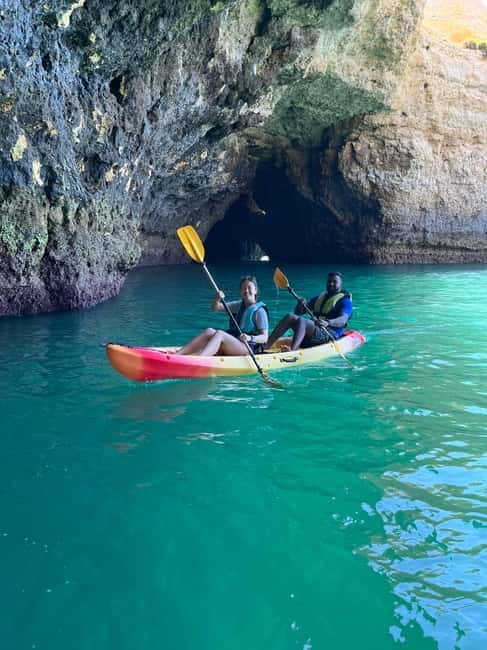 Albufeira: Caves and Cliffs Kayaking Tour - The guides and safety system that keep it fun