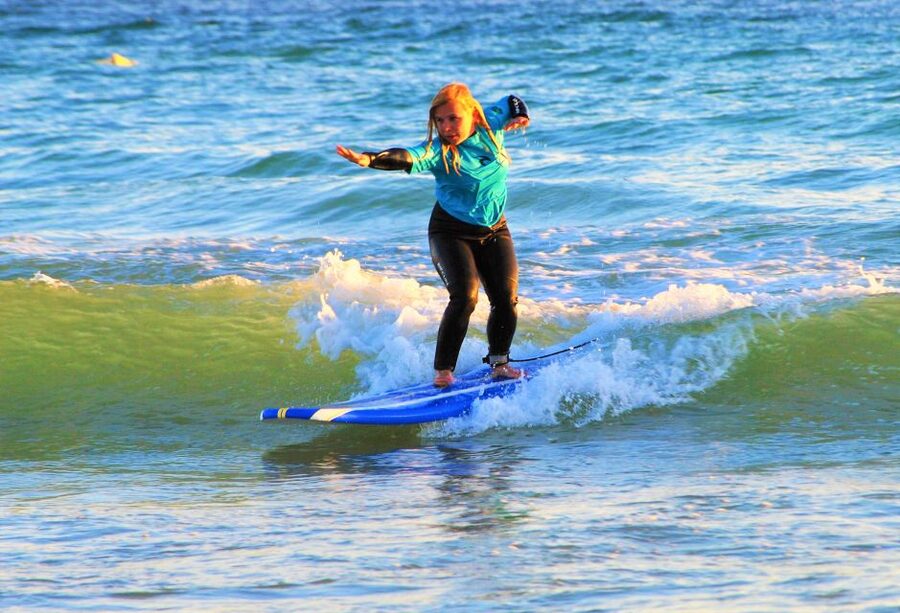 Albufeira: Surfing Lesson at Galé Beach - Meet at the pier shop: find Surf4Fun and get suited up
