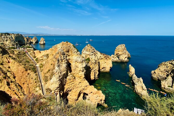 Algarve: Lagos Sightseeing guided Tour with e-bikes - Old Castle and Bandeira Fort: Town textures, then cliff-edge air