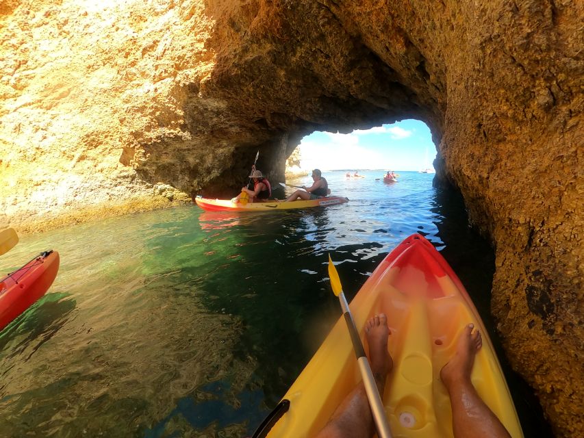 Alvor: Explore Caves Boat and Kayak Tour - The Alvor cruise: bar drinks, music, and local stories on deck