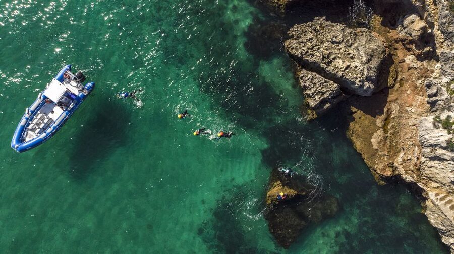 Arrábida: Setubal, Sesimbra Coasteering & Speedboat Tour - Safety, guide skill, and why Swiftwater training shows up in your day