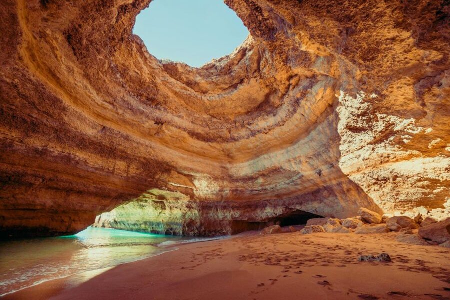Benagil: Caves, Coves & Secret Beaches Guided Kayaking Tour - Benagil Sea Cave: Sunlight, Multicolored Limestone, and the Photo Window