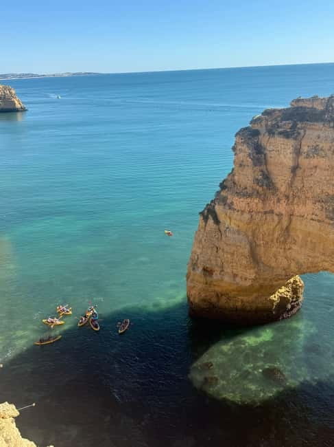 Benagil: Guided Kayak Tour inside caves and Praia da Marinha - Praia da Marinha from the kayak: dramatic cliffs up close