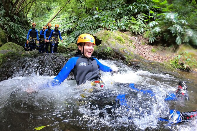 Canyoning Experience - half day - Entering the stream bed, slides, jumps, and rappels