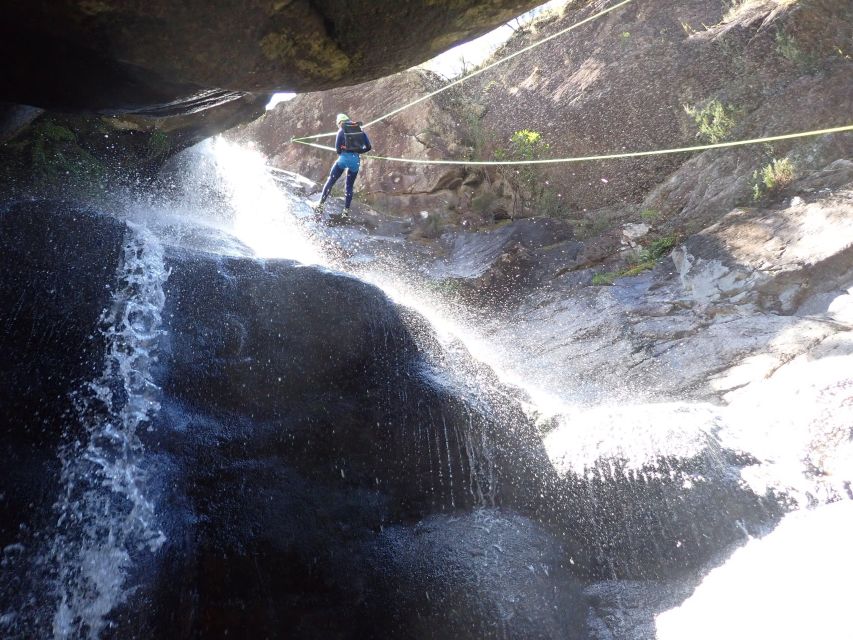Canyoning Tour in Portugal - Following the crystal-clear water trail, swimming and sliding through natural slopes