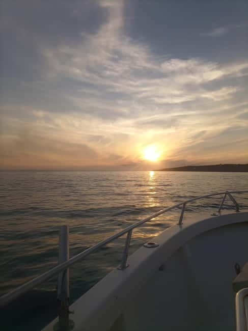 Cascais: Sunset Boat Trip with Welcome Drinks - Costa da Guia cliff area, where the coastline gets dramatic