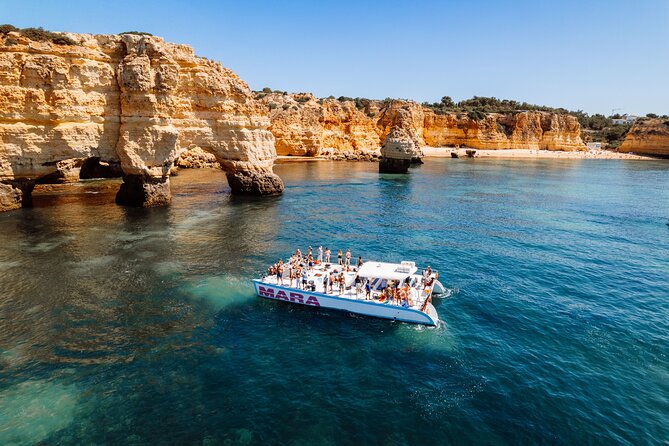 Catamaran Cruise: Caves and Coastline to Benagil - Crew style and live commentary: what makes it feel guided