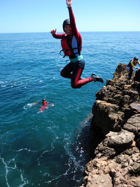 Coasteering Algarve: Cliff Jump, Swim & Climb in Sagres - Sea-cave swims and grotto time: the best kind of scenery break