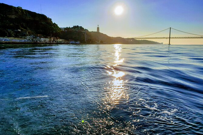 Daytime/Lisbon Sunset Boat with history and wine (small group) - Belem views, plus the Tagus surprises like dolphins