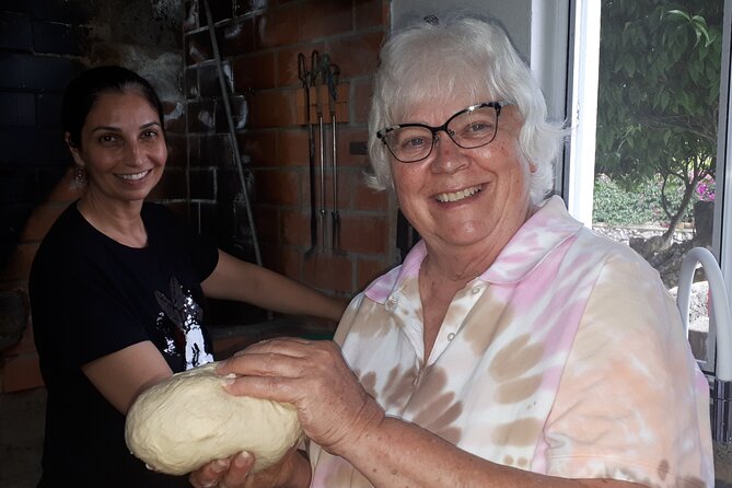 Dining Experience with local family - Helping make bread, not just eating it