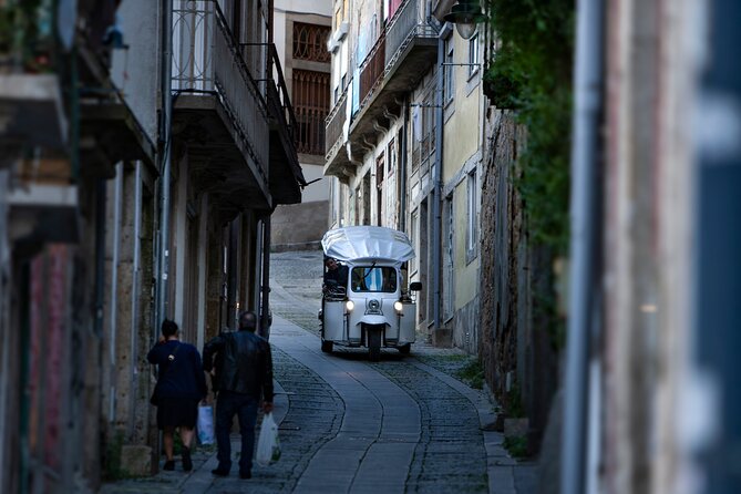 Discover Porto's Highlights on a 2-Hour Private Electric Tuk Tuk - Batalha district and São João Theatre: where Porto’s daily life shows up