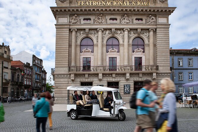 Discover Porto's Highlights on a 2-Hour Private Electric Tuk Tuk - Cross the Ponte do Infante for modern Porto views