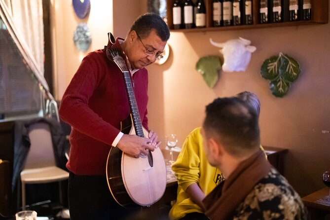 Fado Musical Experience with Portuguese Wine & Appetizers - Entering the fado house: why small rooms change everything