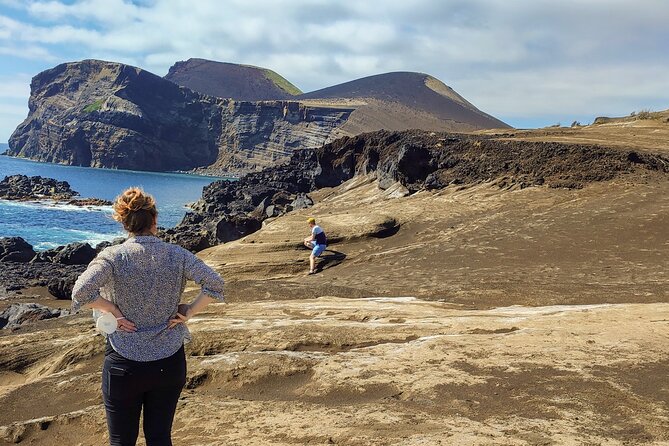 Faial Island: Half Day Tour - Capelinhos: gray sands, green hills, and Atlantic drama