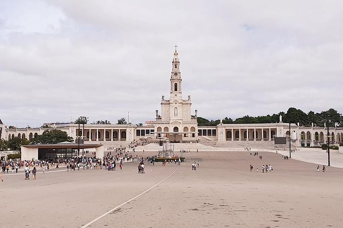 Fátima & Coimbra: Full Day Private Tour from Porto - Fátima Town: Where Legend, Reconquest, and Pilgrimage Meet