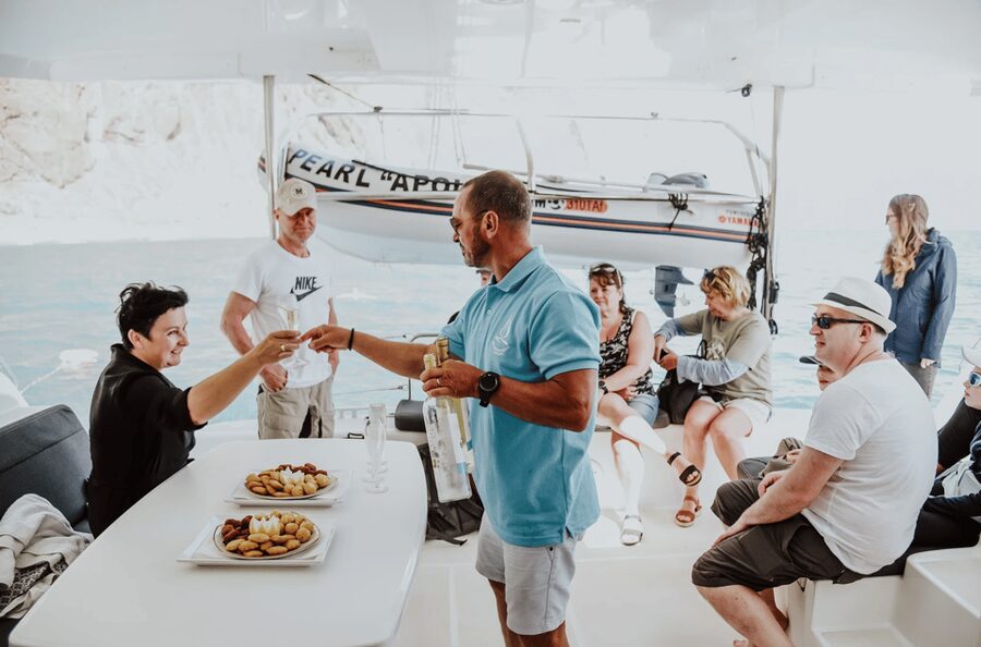 From Funchal: Cabo Girao Sunset Cruise on Luxury Catamaran - Onboard Comfort: Bathrooms, Guide Help, and Optional Drinks