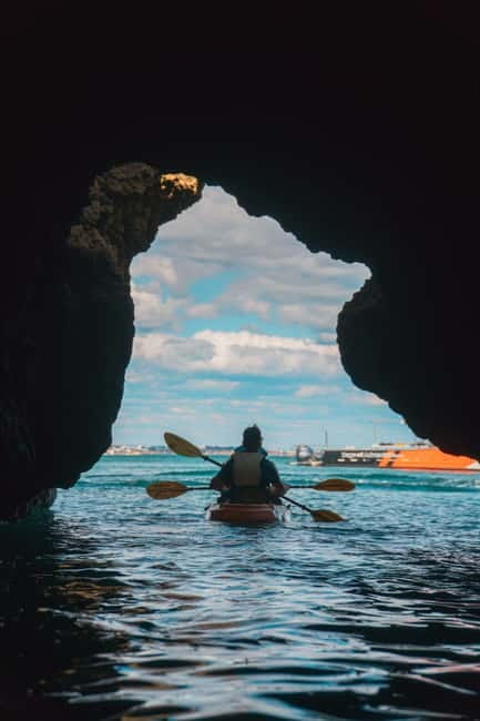 From Lagos: Ponta da Piedade Caves Kayak Tour from Catamaran - Paddling the caves and arches for about 1 hour 15 minutes