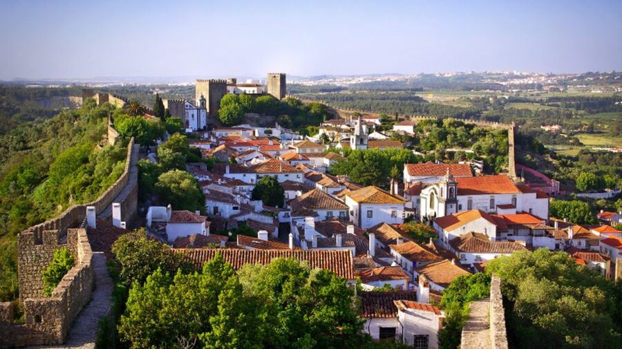 From Lisbon: Fátima, Batalha, Nazaré & Óbidos Full-Day Tour - Óbidos: Walled Medieval Streets, Whitewashed Houses, and Ginjinha