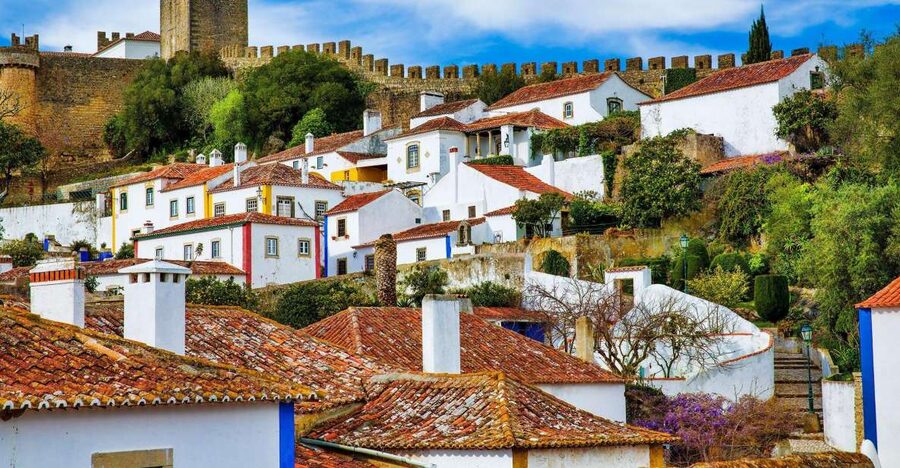 From Lisbon: Fátima, Óbidos Medieval, Nazaré Atlantic Coast - Price and value for a $63 full-day outing