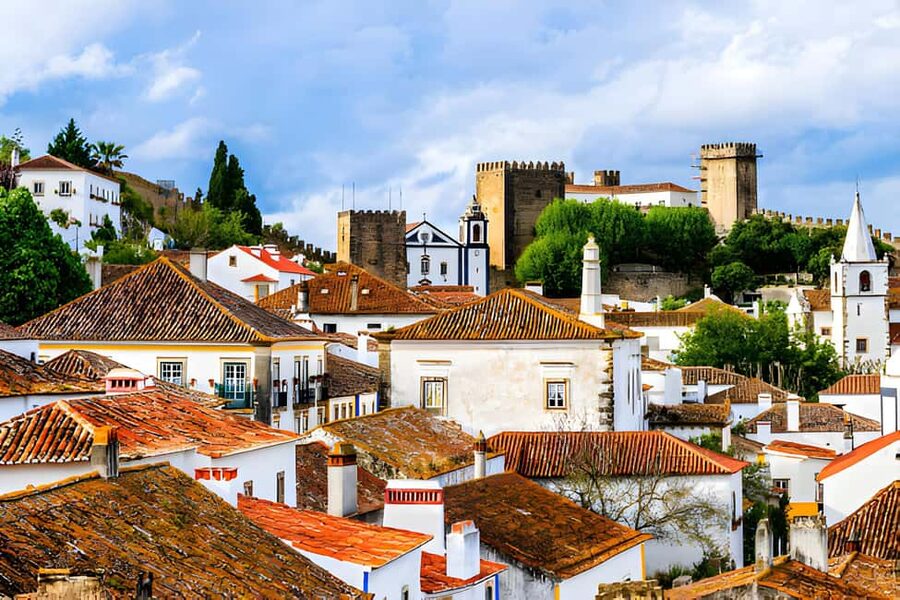 From Lisbon: Obidos, Nazaré and Fátima Small Group Tour - Lisbon pickup, comfort, and how the van ride shapes your day