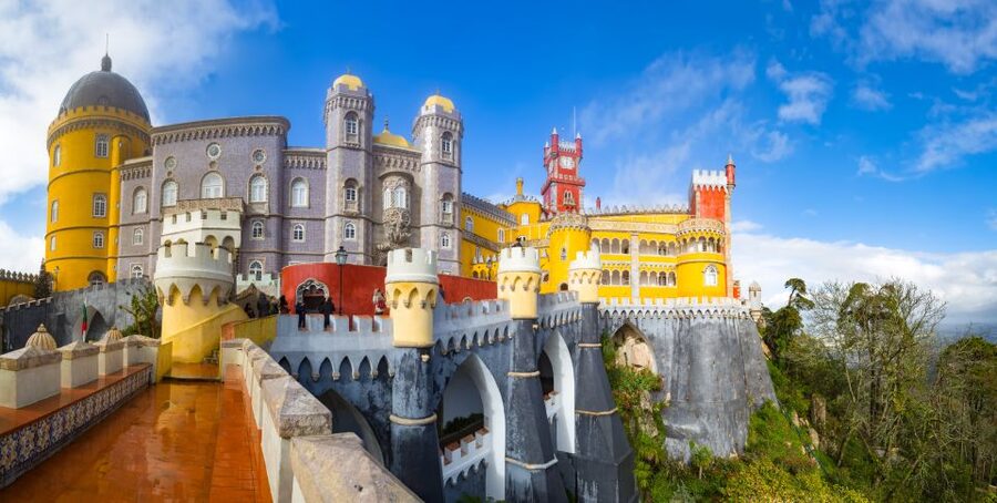 From Lisbon: Sintra Tour - Pena, Regaleira & Monserrate - Pena Palace: Color, Symbols, and a Royal Summer Stage