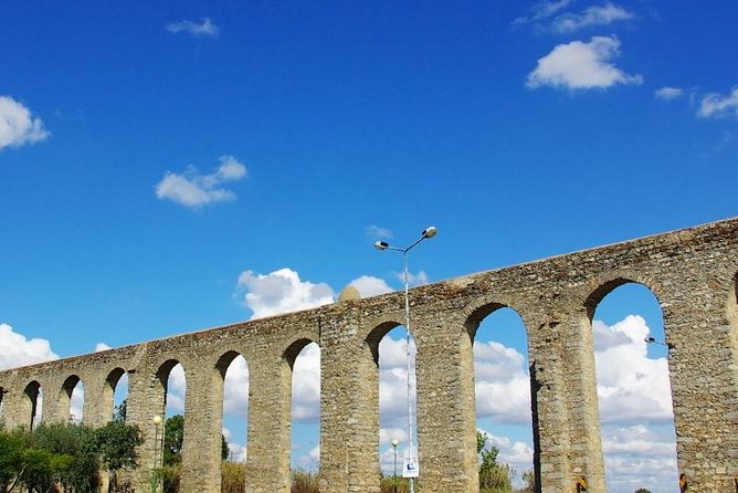 From Lisbon to Alentejo: Évora and Megaliths Full-Day Group Tour - Almendres Cromlech: the megalith alignment story and what to expect