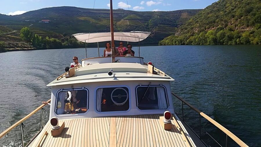 From Pinhão: Private Yacht Cruise along the Douro River - Your yacht comfort: glass lounge, open roof, and room to relax