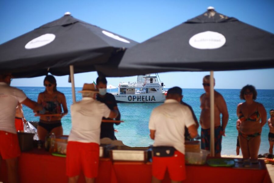 From Portimão: Catamaran Cruise to Benagil Caves with BBQ - Benagil beach BBQ and open bar: food that keeps the day easy