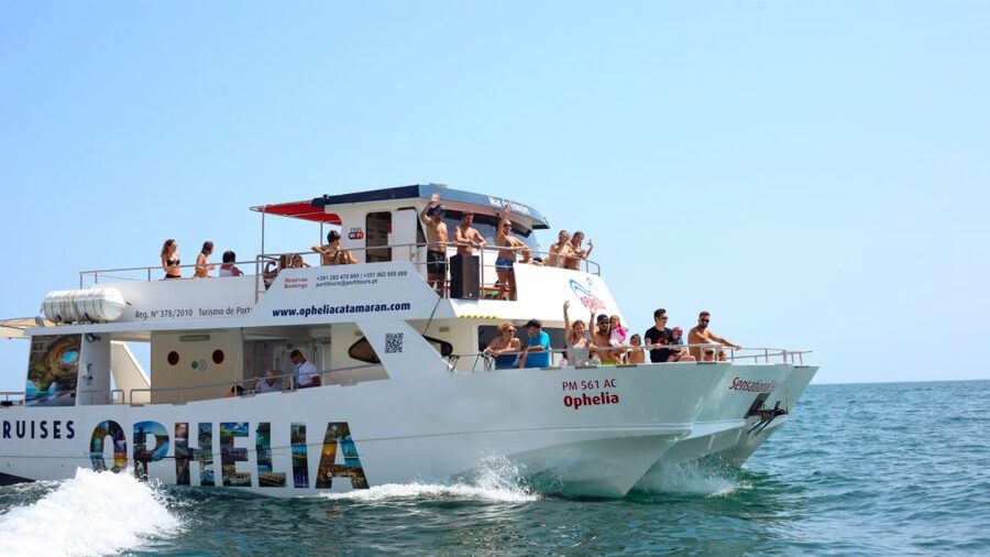 From Portimão: Catamaran Cruise to Benagil Caves with BBQ - Portimão to Ferragudo: a scenic start you feel in your shoulders