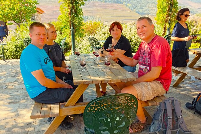 From Porto: Douro Valley Tour with 2 Wineries, Lunch and Cruise - Vale do Douro cellar lunch: DOC wines plus Port education