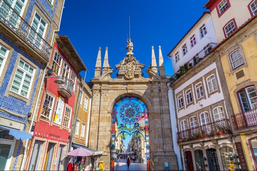 From Porto: Wonders of Braga & Guimaraes Private Day Trip - The city walk stops: churches, arches, and the feel of older streets