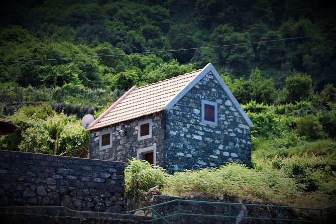Full Day Tour of Madeira West - Ribeira Brava promenade stop: church, cafes, and the wild-river name