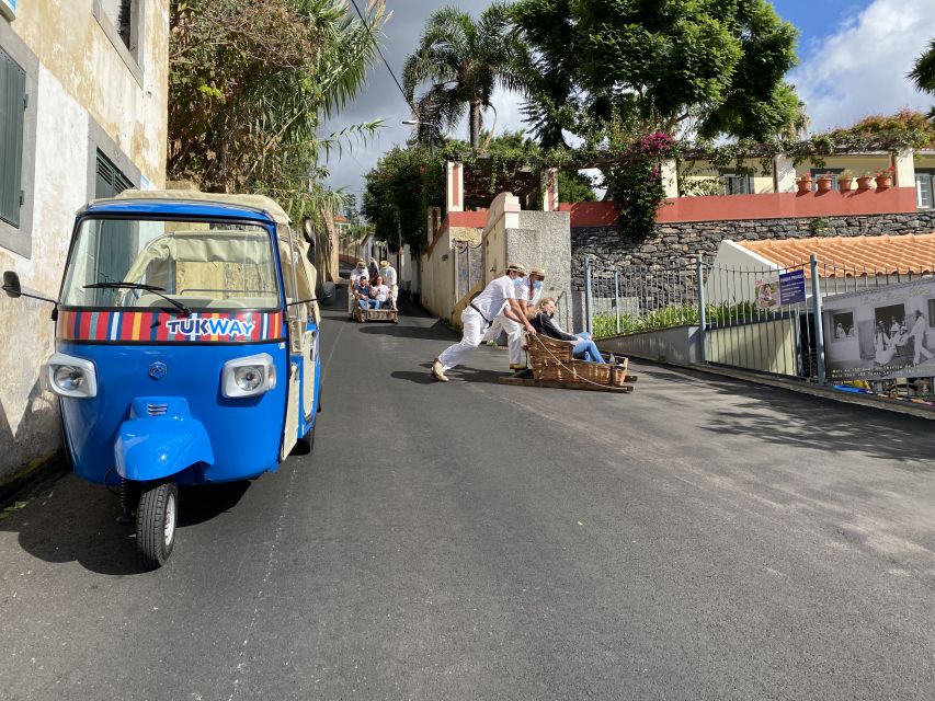 Funchal: Monte Tropical Garden & Toboggan Ride by Tuk Tuk - Getting up the hill: Old Town Funchal, viewpoints, and local stories