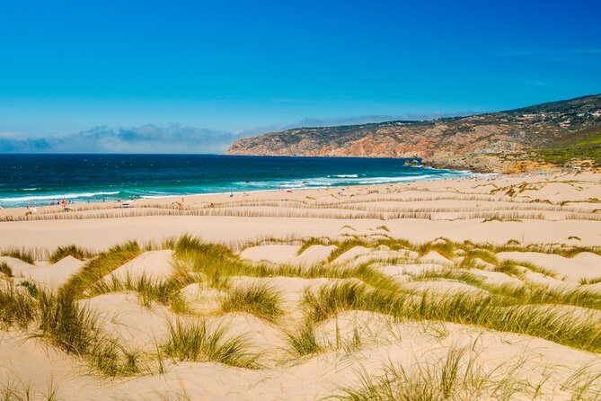 Group Tour to Sintra, Pena, Regaleira, Cabo da Roca & Cascais - Guincho Beach: Atlantic Wind, Big Waves, Short Stop