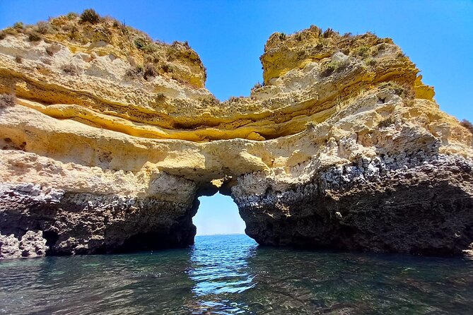 Kayak Adventure through the Ponta da Piedade Caves in Lagos - Boat Ride to the Main Area: Comfort Before the Paddling