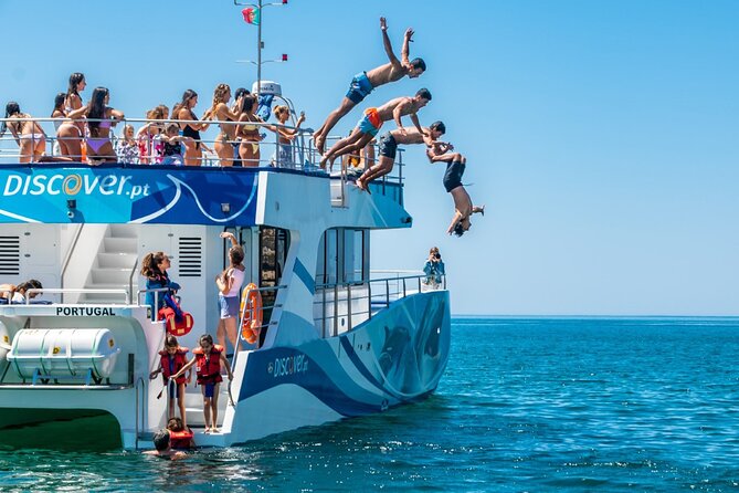 Lagos: Dolphins & Benagil Caves – Catamaran - The swim stop, inflatable water park, and slide: the family payoff