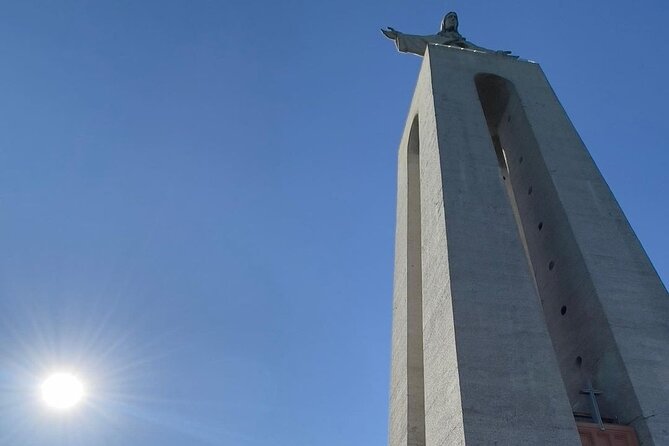 Lisbon: Arrábida & Sesimbra Tour – Wine, Nature & Beaches - Stop 1: Santuario Nacional de Cristo Rei for wide river and city views
