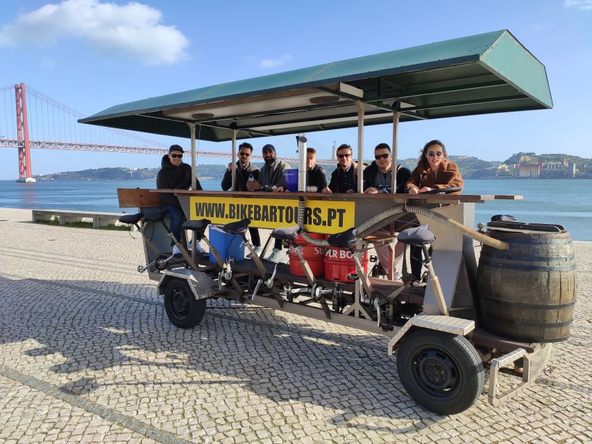 Lisbon: Beer Bike Tour with Sangria and Beer - One hour of Lisbon highlights, from MAAT to the Monument to Fado