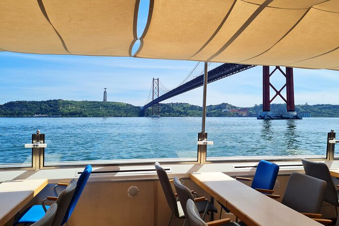 Lisbon Boat ride on Tagus river - Torre de Belém from the boat, plus Christ the King across the river