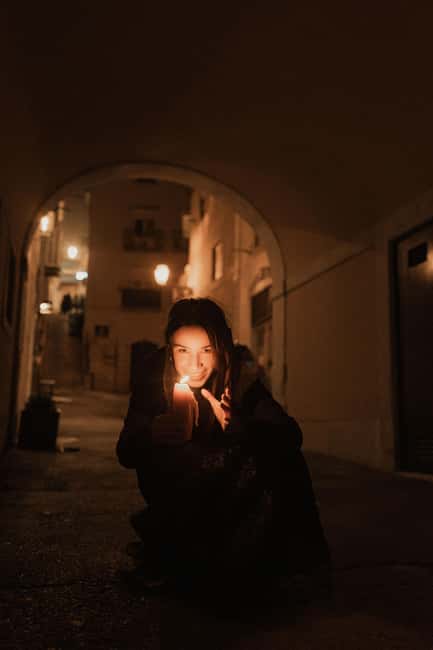 Lisbon by Night: Guided Walking Tour - The Unholy Secrets - Walking conditions: shoes, pace, and weather reality