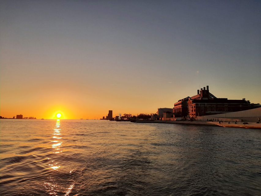 Lisbon: City Skyline Sailboat Cruise with Drink and Snacks - Santo Amaro Dock, Gate 1: your start point under the bridge