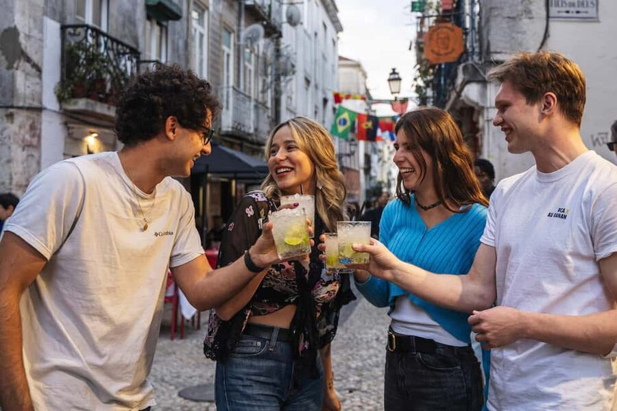Lisbon: Drunken History Walking Tour with Included Drinks - Largo do Carmo to Bairro Alto: The Night Starts With a Job to Do