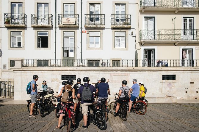 Lisbon E-Bike Tour Commerce Square, Mouraria and Alfama - São Vicente de Fora rooftop moment: monasteries plus big sky
