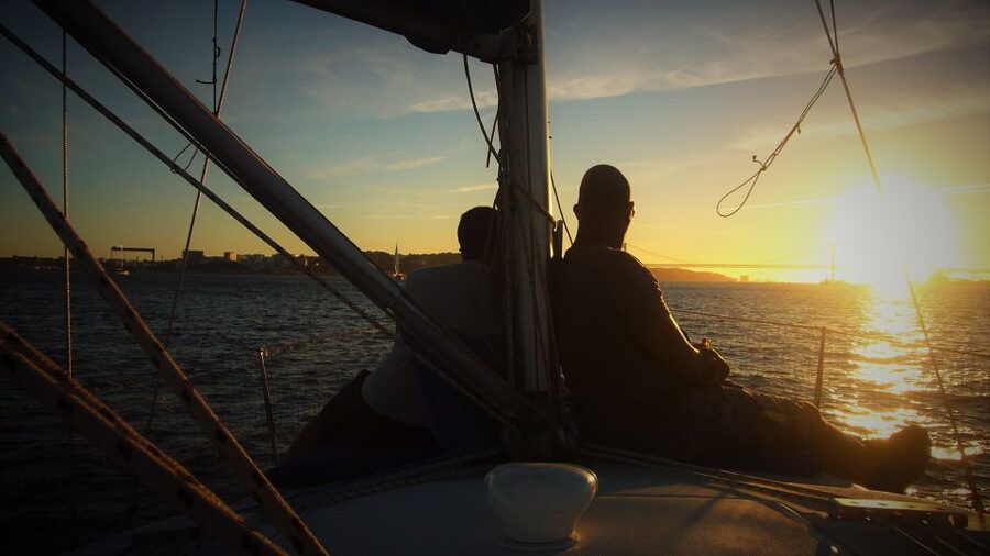 Lisbon: Enjoy a Sunset or Night Tagus River Sailboat Cruise - South bank sights: old forts and prisons, plus the 25 April Bridge build